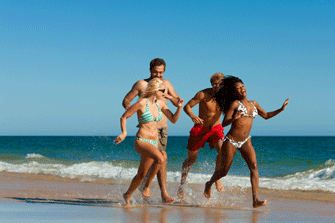 friends running on beach